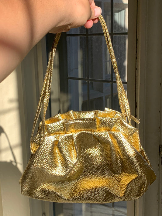 Sac doré vintage