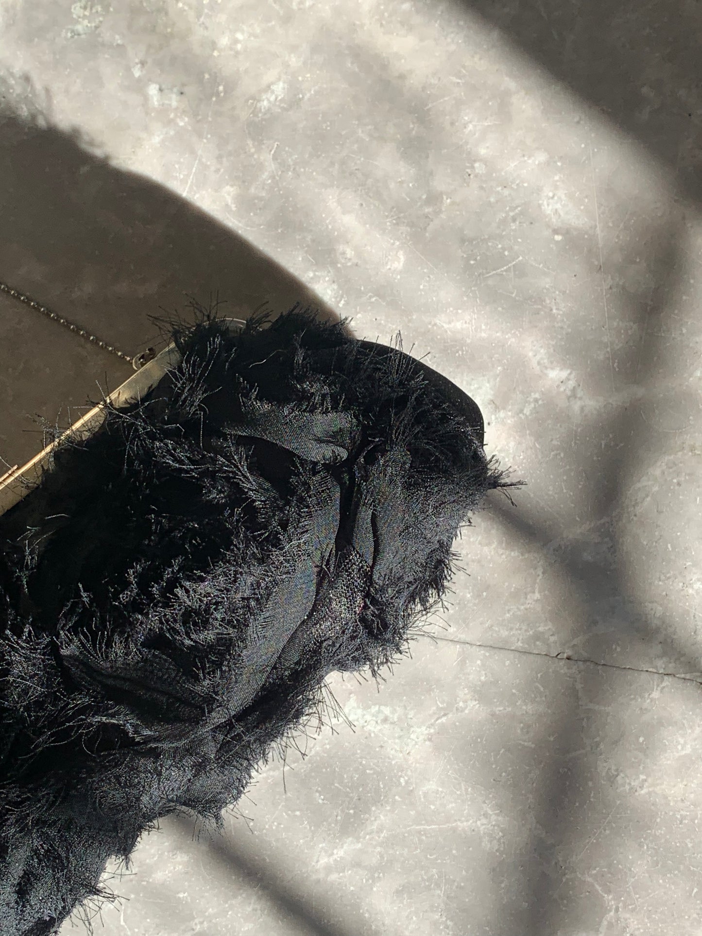 Bourse noire brodée