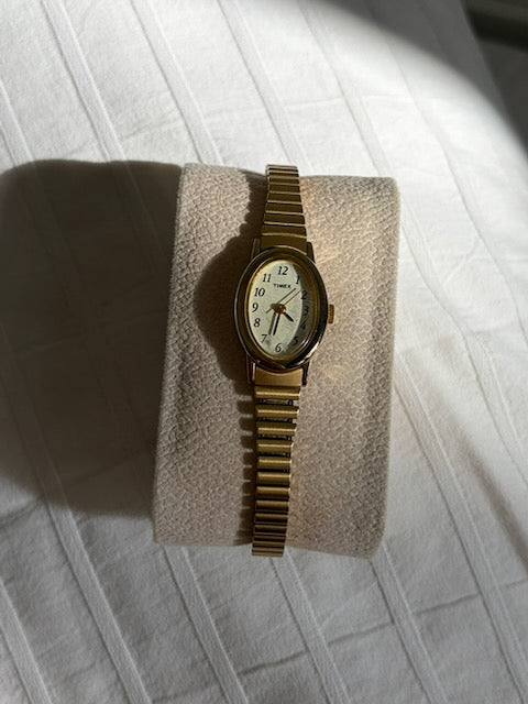 MONTRE EXTENSIBLE: TIMEX BRACELET DORÉ VINTAGE