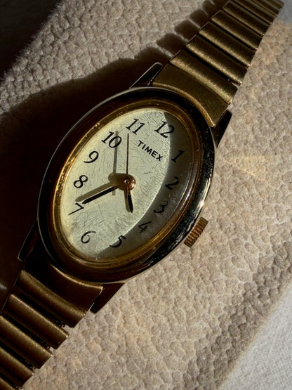 MONTRE EXTENSIBLE: TIMEX BRACELET DORÉ VINTAGE