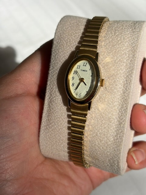 MONTRE EXTENSIBLE: TIMEX BRACELET DORÉ VINTAGE