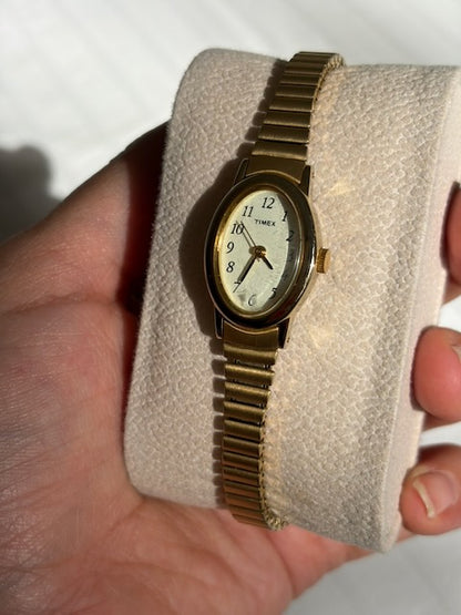 MONTRE EXTENSIBLE: TIMEX BRACELET DORÉ VINTAGE
