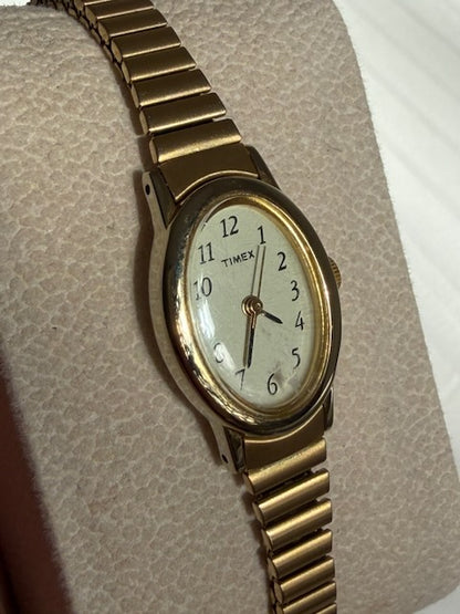 MONTRE EXTENSIBLE: TIMEX BRACELET DORÉ VINTAGE