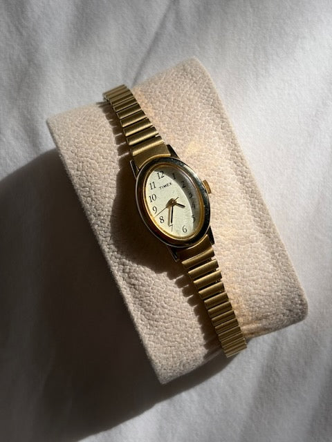 MONTRE EXTENSIBLE: TIMEX BRACELET DORÉ VINTAGE