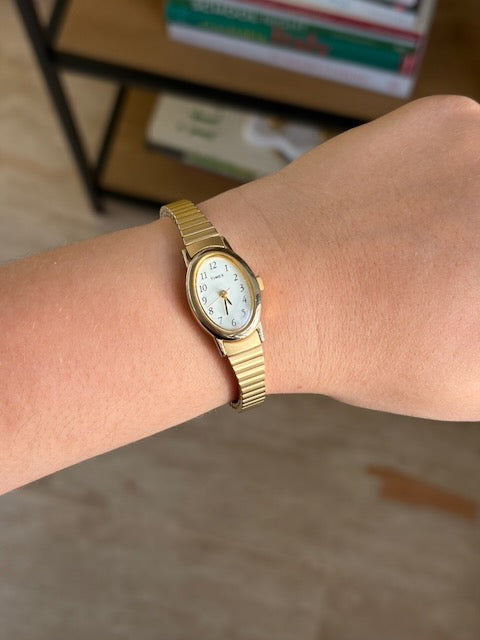 MONTRE EXTENSIBLE: TIMEX BRACELET DORÉ VINTAGE