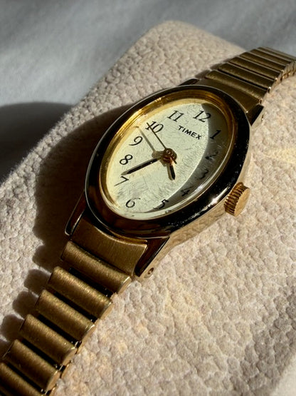 MONTRE EXTENSIBLE: TIMEX BRACELET DORÉ VINTAGE